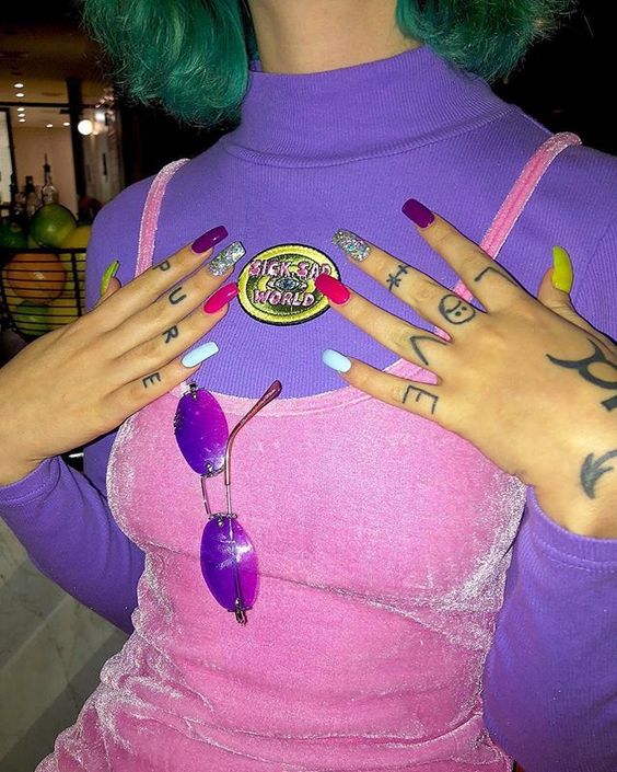 Woman in Purple with Long Nails